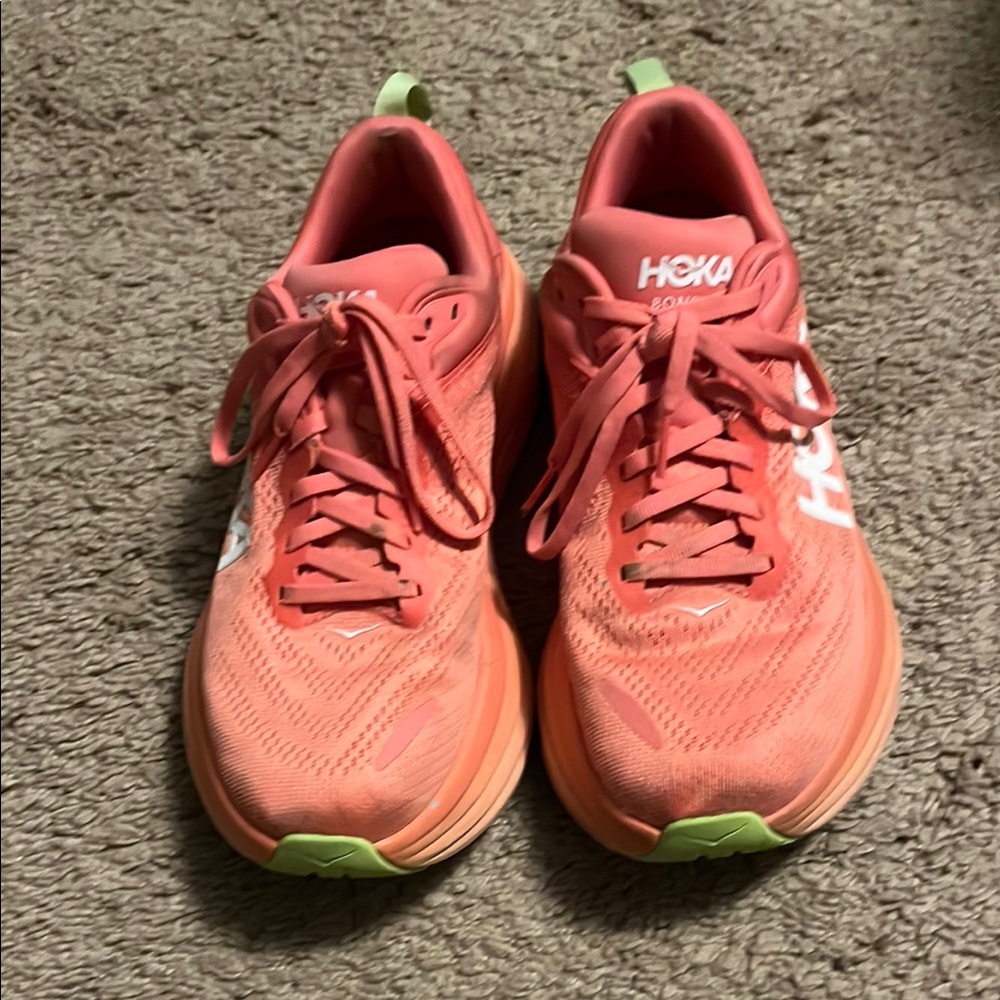 Hoka Pink and Green Athletic Shoes with Streamlined Design